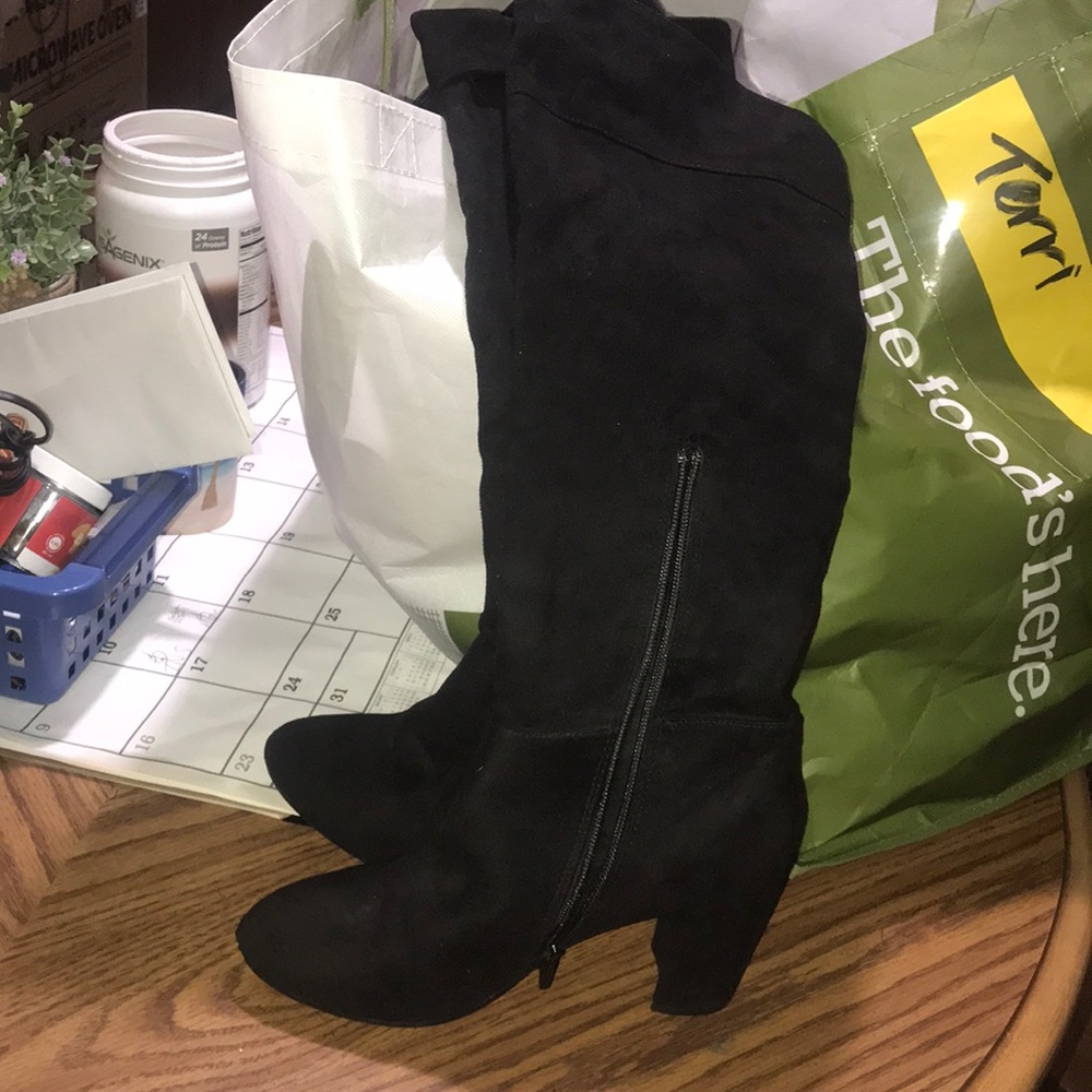 Knee high zip up boots
